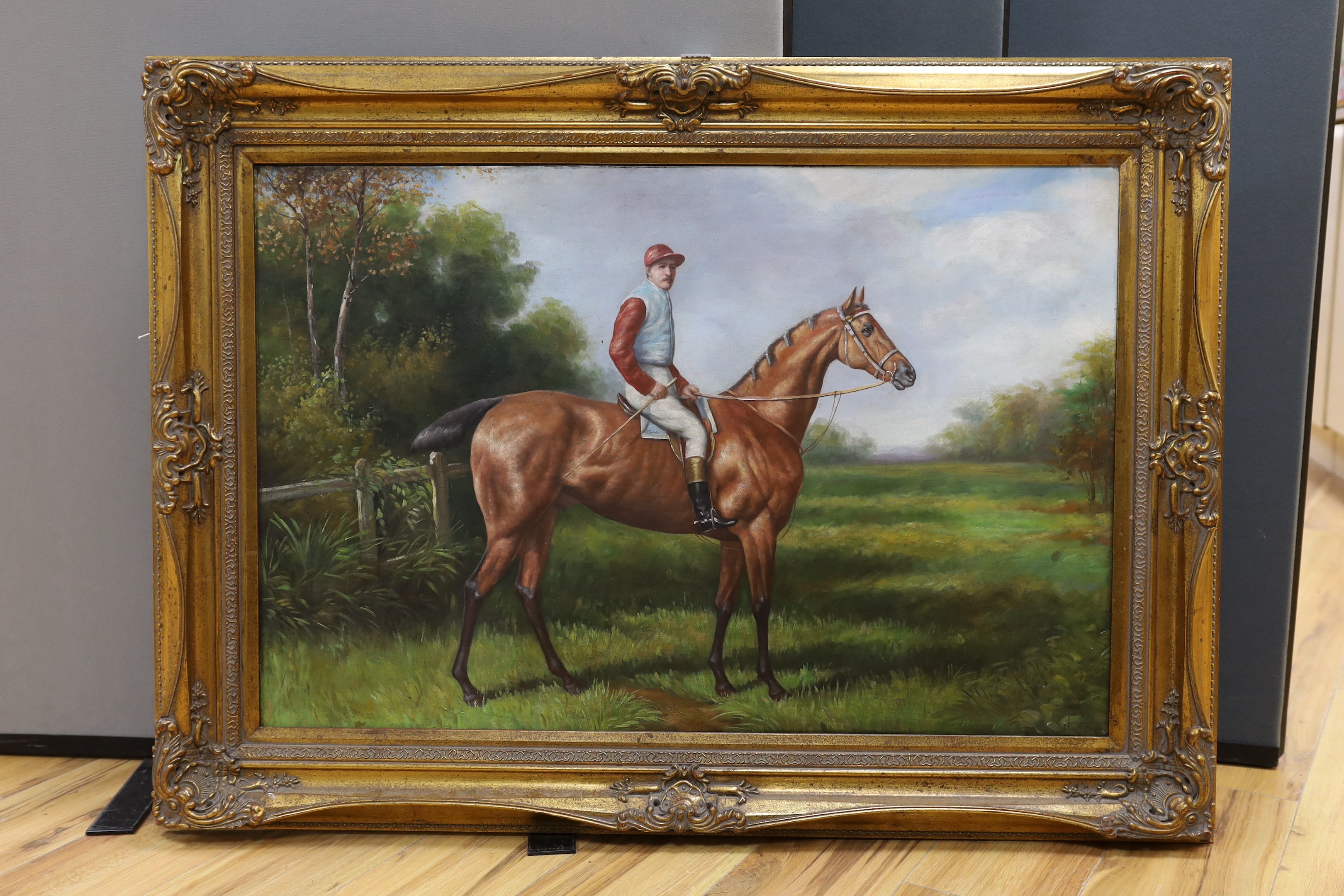 A modern oil on canvas, Portrait of a racehorse with jockey up, 60 x 90cm